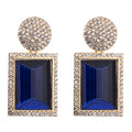 Boucles d'oreilles géométriques tendance en métal et diamants